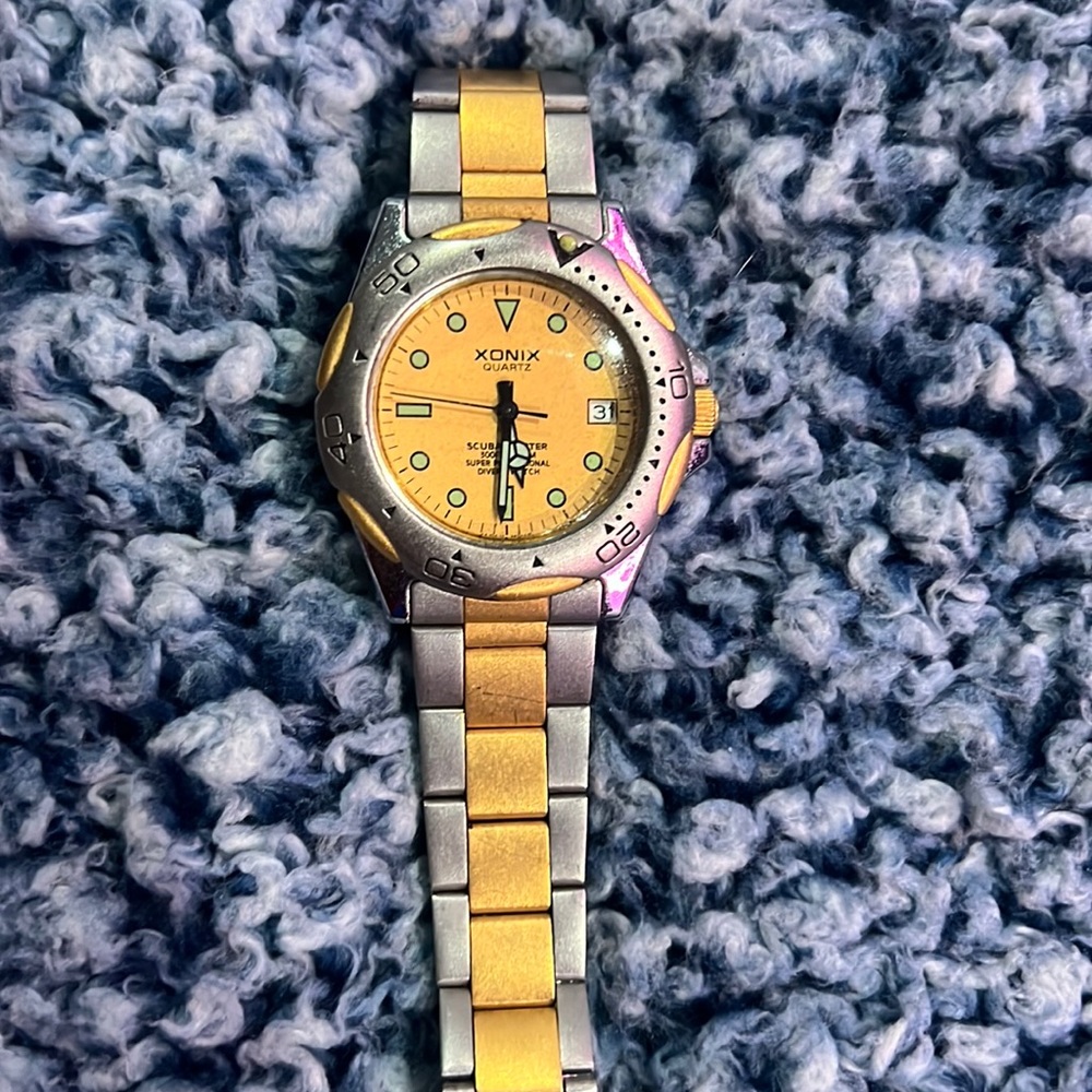 heavy duty stainless steel Xonix watch water resistant (batteries not included)